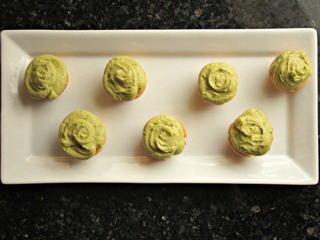 Plated green tea cupcakes with matcha frosting