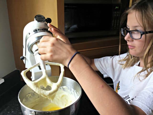 Breaking eggs for sierra mist cake