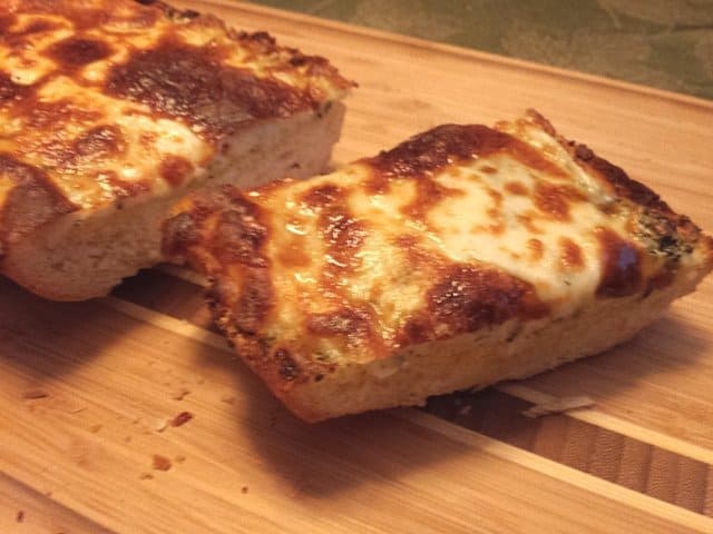 Slice of cheesy garlic bread