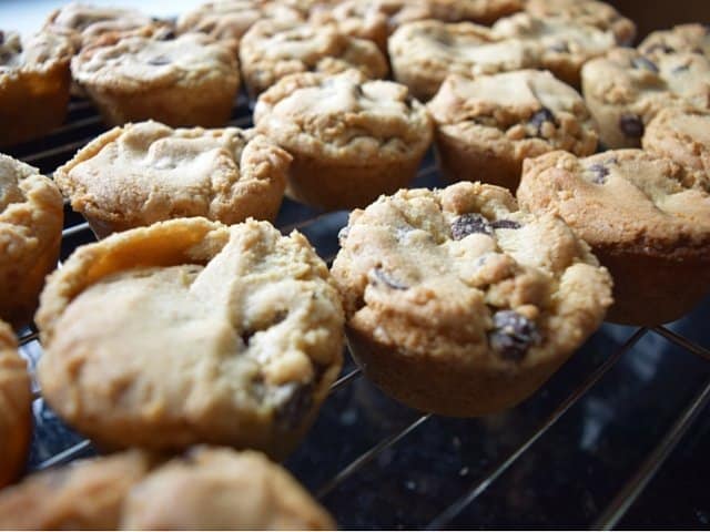 Candy bar stuffed cookies cooling on the rack
