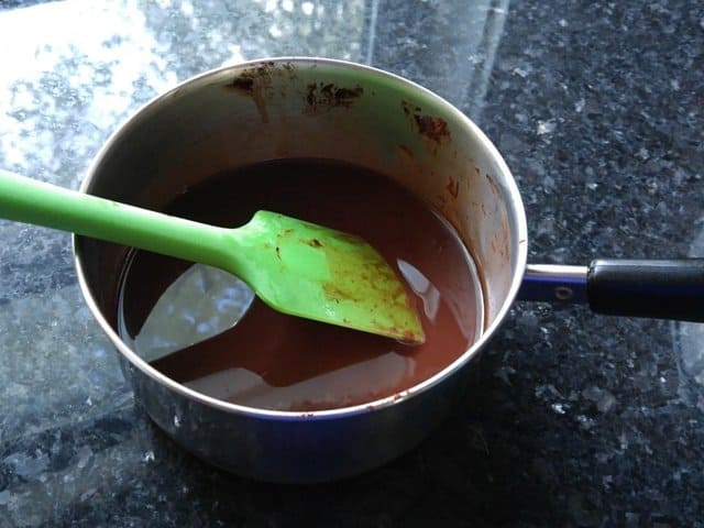 Melt together butter cocoa powder and chocolate