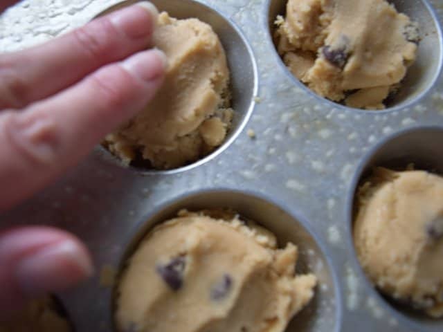 Pat down cookie tops before baking