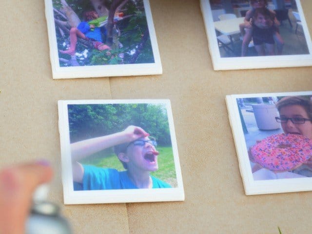 Apply spray acrylic to Modge Podge dried photo coasters