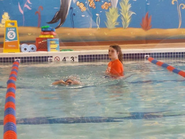 Enjoying swim lessons at Goldfish swim school
