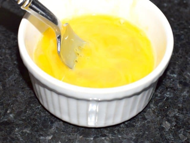 Lightly beat the egg