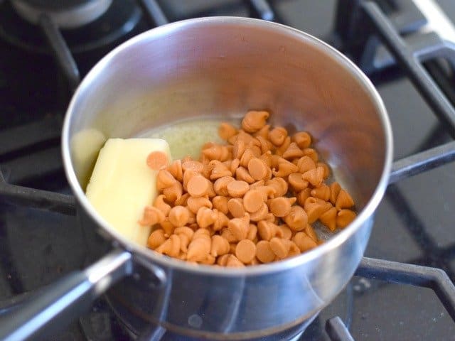Melt together butter and pumpkin morsels