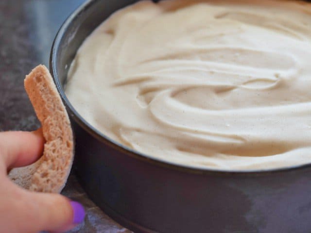 Run a hot sponge along the outside of the springform pan to loosen the ice cream