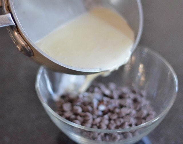 Add cream to dark chocolate