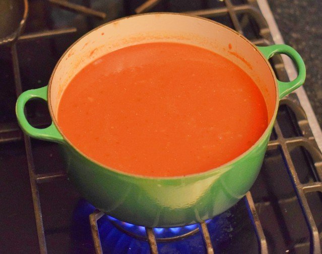 Add tomatoes and chicken stock