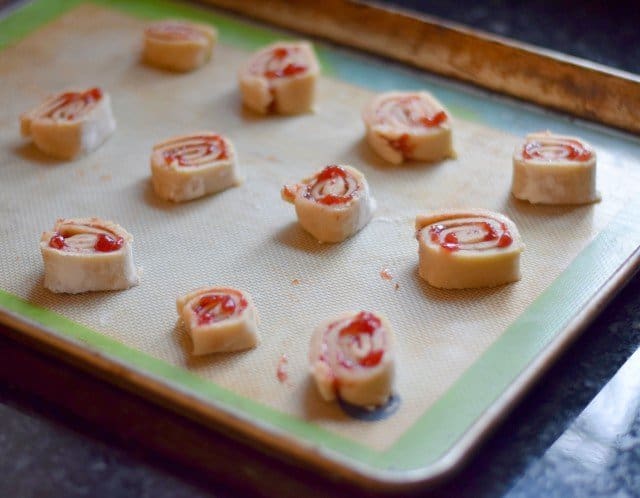 Place cherry pie pinwheels onto a baking sheet