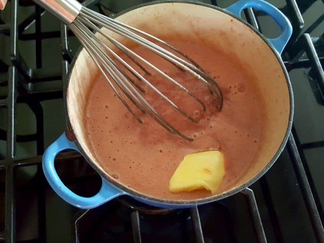 Add butter and whisk strawberry curd until incorporated