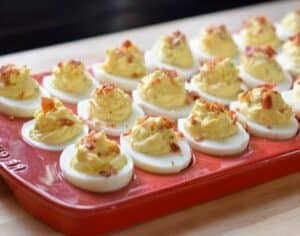 Delicious bacon deviled eggs ready for a party