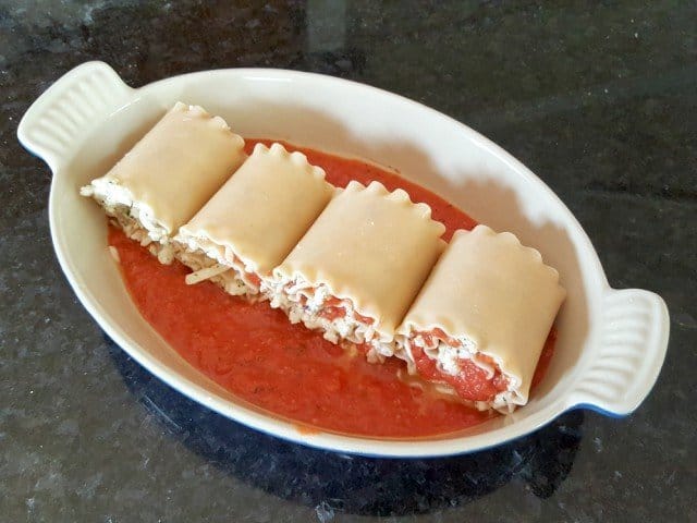 Add lasagna roll ups to dish to bake