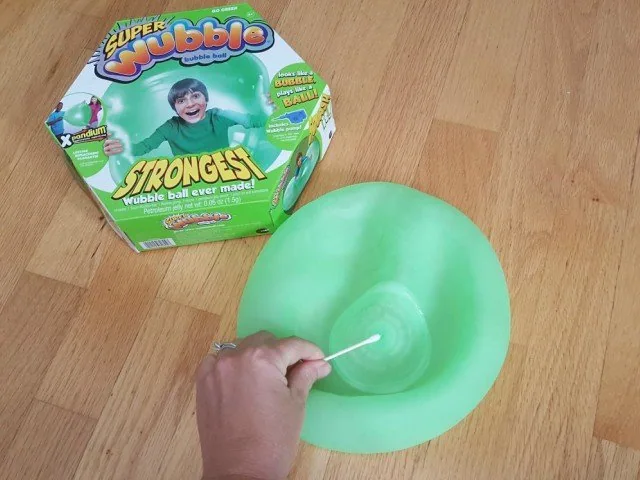 You need to lubricate the super Wubble ball to get the nozzle to insert fully