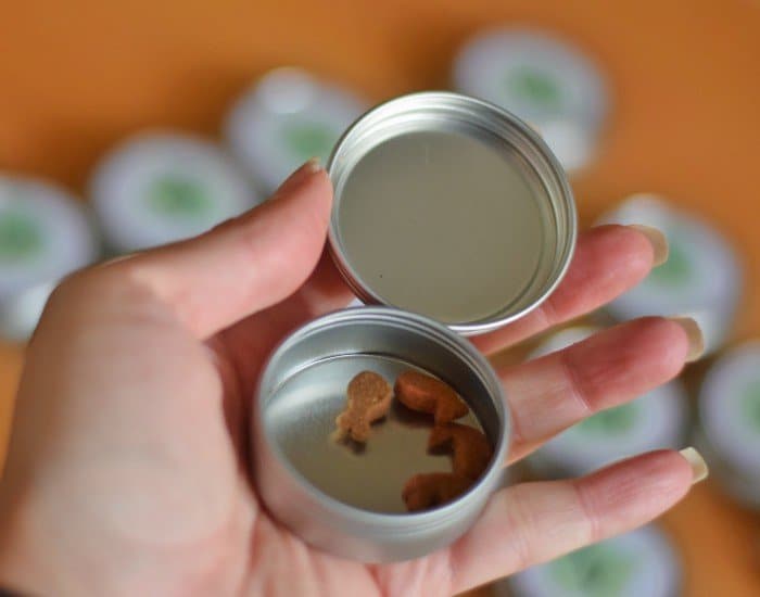 Add treats to tins