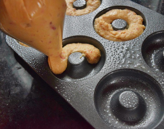 Pipe batter into donut pan