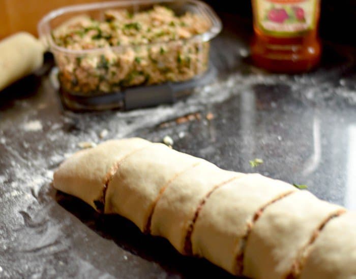 Slice pizza rolls into even pieces