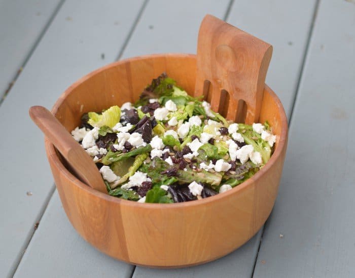 Bowl of cherry goat cheese salad with a homemade red wine vinaigrette
