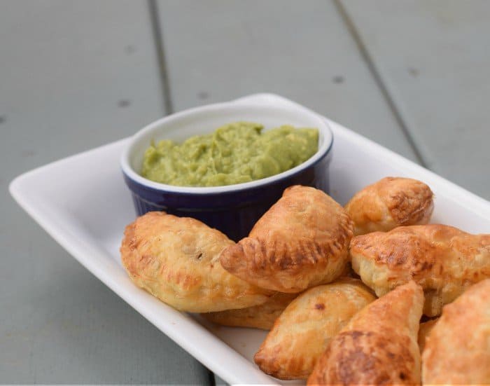 Enjoy a plate of puff pastry empanadas
