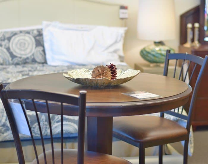 Add a kitchen high top for extra seating in your basement
