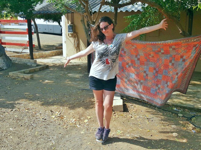 Stand on an ostrich egg in Curacao at the ostrich farm cruise excursion