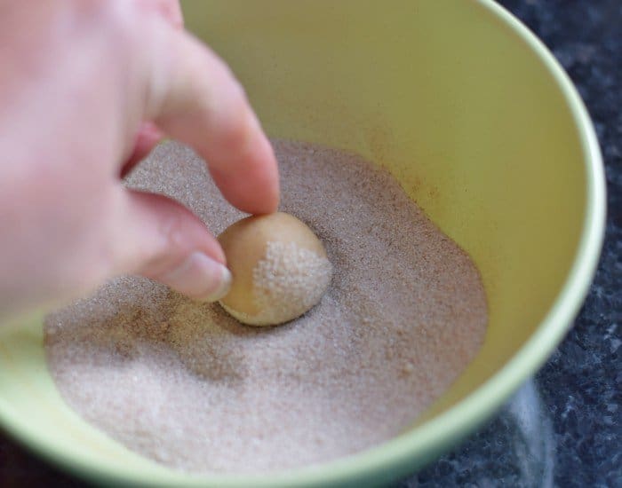 Roll snickerdoodle tuffles in cinnamon sugar