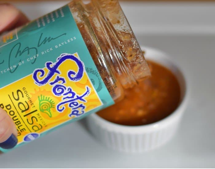 Use Frontera salsa to dip carnitas stuffed quesadillas