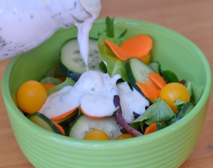 Add yogurt ranch dressing to salad