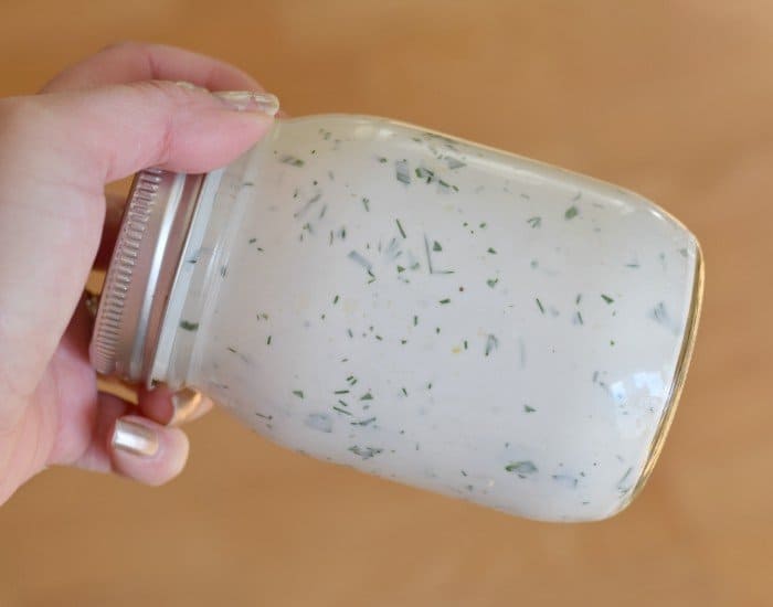 Shake homemade ranch dressing in a jar