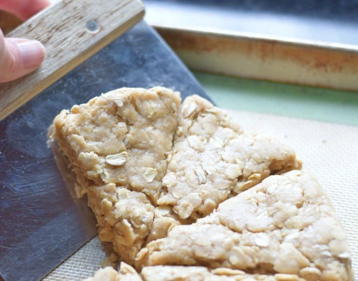 Use bench scraper to pick up scones