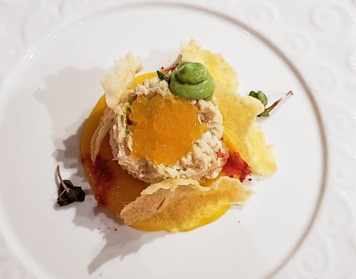 Crab appetizer with mango caviar