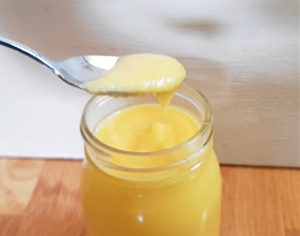 Spoon of mango curd