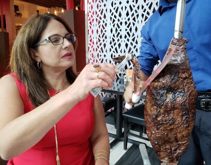 Use tongs for Texas de Brazil meat