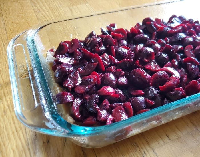 Add cherries to crust