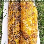 Platter of grilled corn vertical