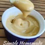 Angled spoon of butterscotch pudding on a table