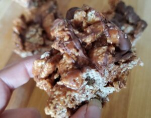closeup of chocolate cereal bar with others in the background