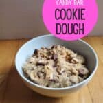 White bowl with cookie dough with text Halloween candy cookie dough.