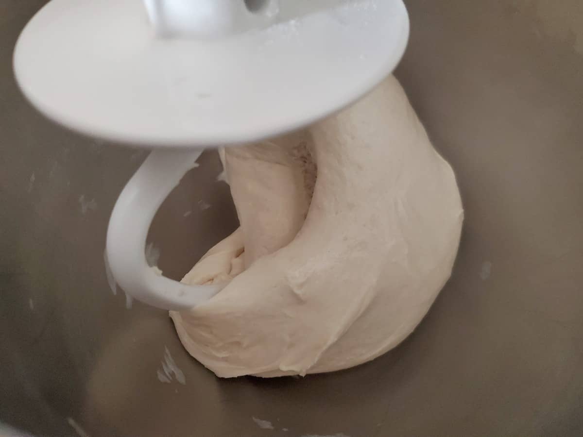 Bread dough around a bread hook.