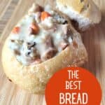 Near overheard of filled bread bowl with text the best bread bowls.