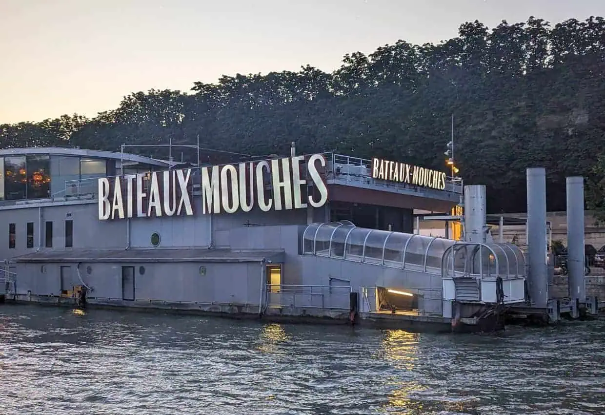 Image shows shows a Bateaux Mouches boat on the river Seine in Paris.