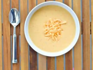 Image shows irresistible beer cheese soup.