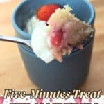 Image shows a spoonful of strawberry mug cake with text.