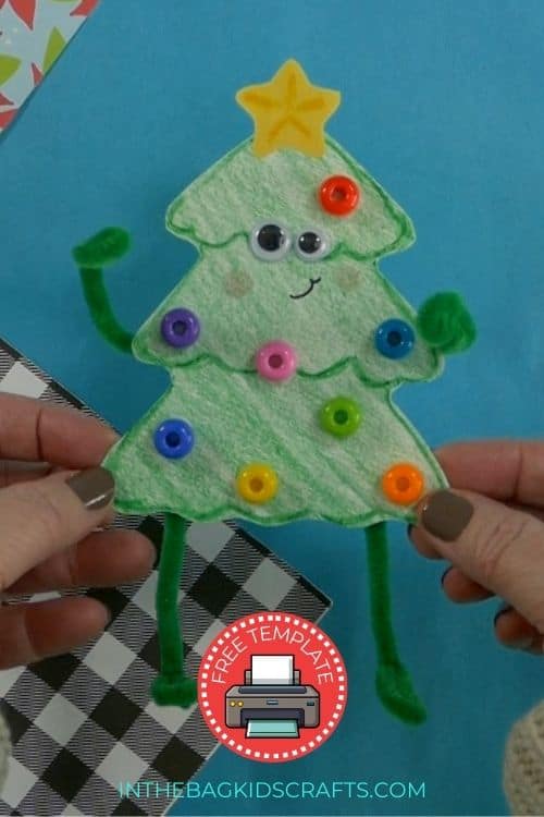 A completed Christmas tree craft made with green paper, colorful beads, pipe cleaners, and a star topper, perfect as an easy craft for kids and a festive Christmas tree craft. 