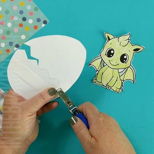 Dragon Craft Printable step 4 creating the hinge for the dragon egg 