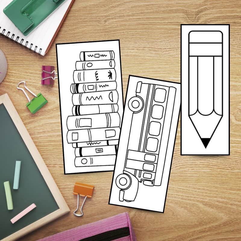 back to school bookmarks on desk bus, stack of books and pencil