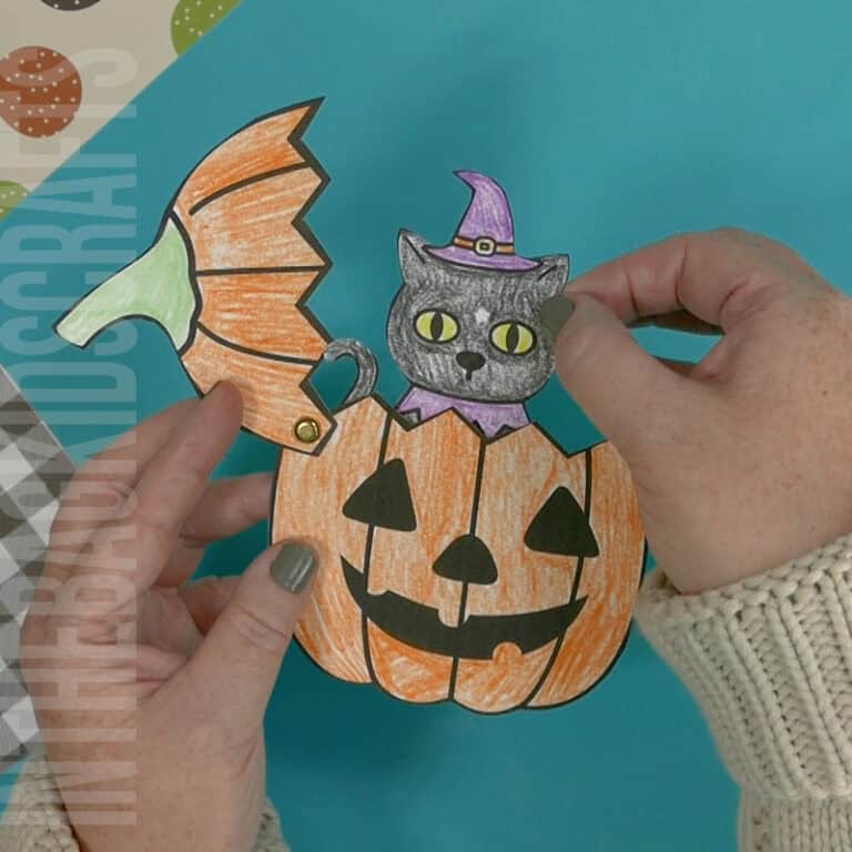 An image showing a Halloween craft for kids featuring a pumpkin craft and black cat craft, using a Halloween printable template.