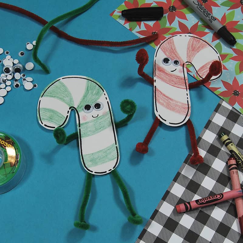 A colorful Christmas craft featuring a simple candy cane craft, perfect as an easy craft for kids during the holiday season.