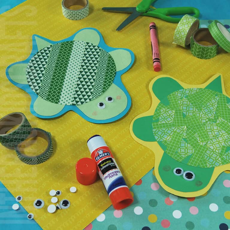 Colorful turtle crafts made with green and patterned washi tape, glue, and craft materials, perfect as a fine motor activity for preschoolers.