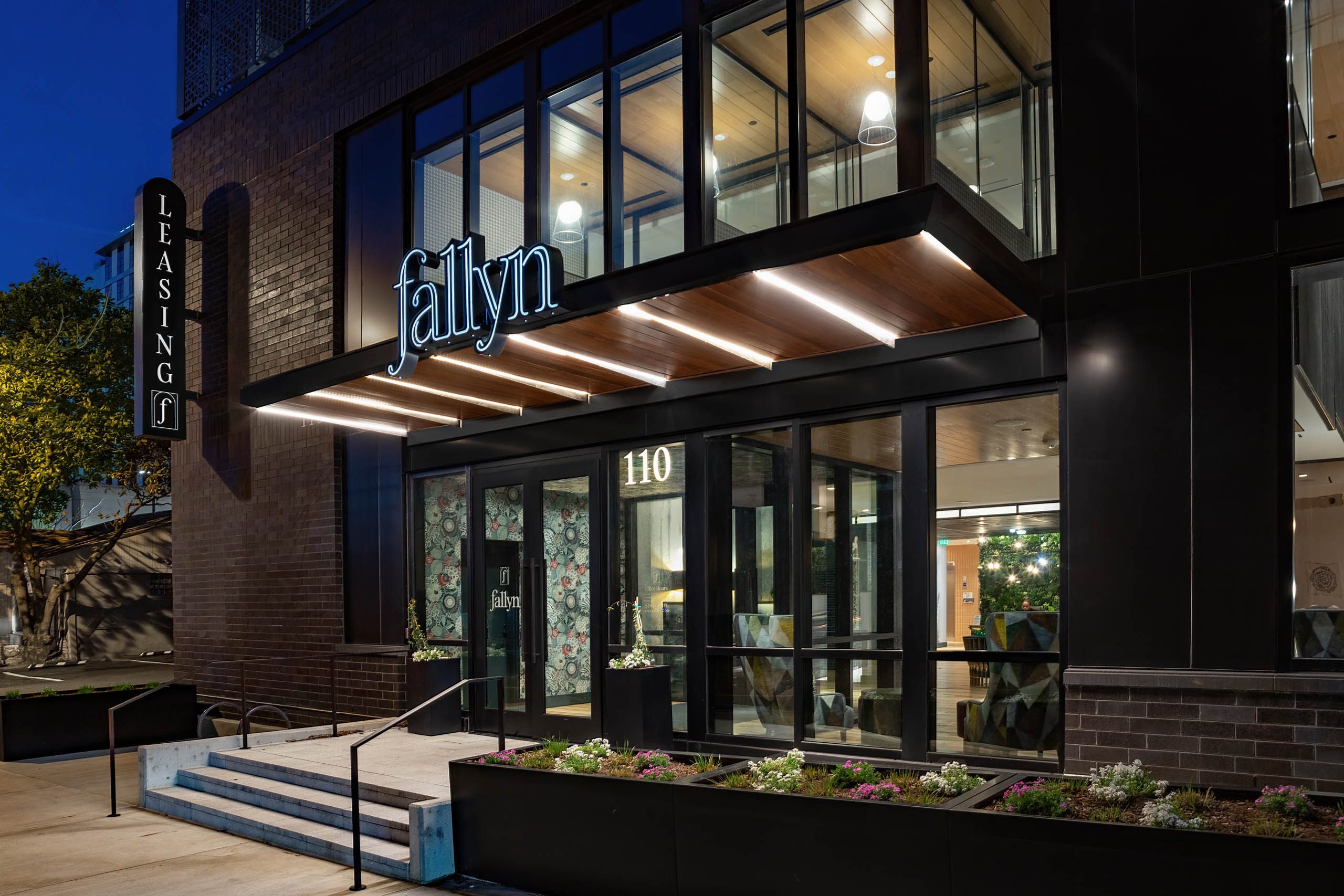 fraye-hotel-fallyn-apartments-front-sign